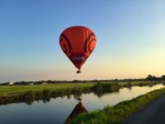 Meesterlijke heteluchtballonvaart in de buurt van Beesd op woensdag 26 juni 2024